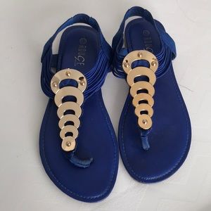 Blue sandals with gold detail